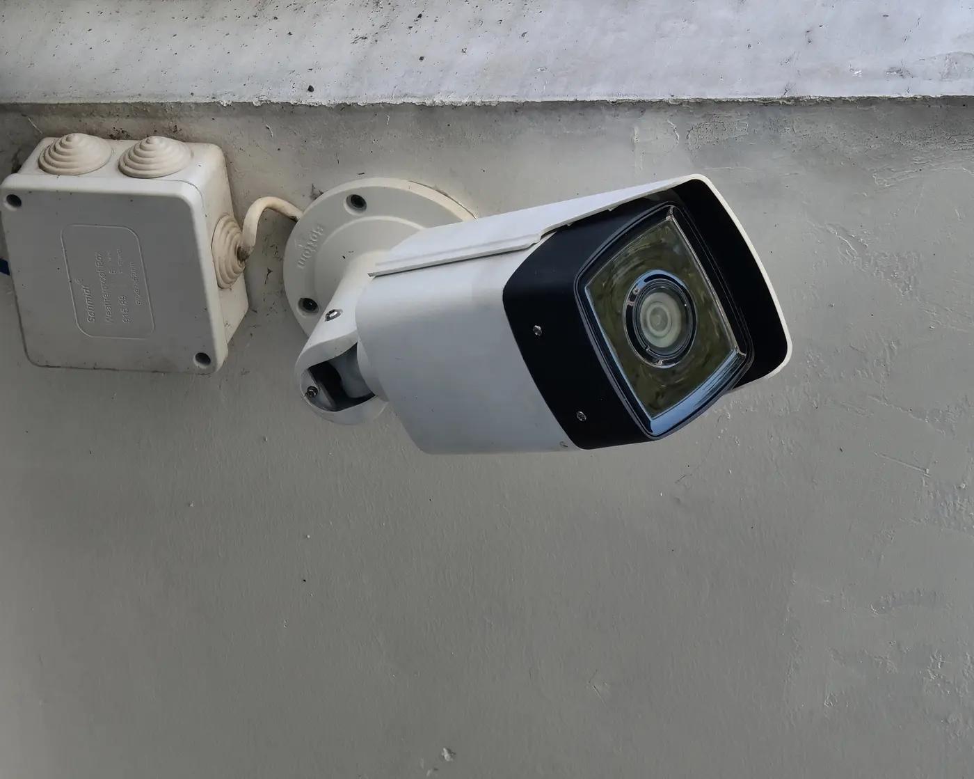 Exterior security cameras around a family home — photo 2