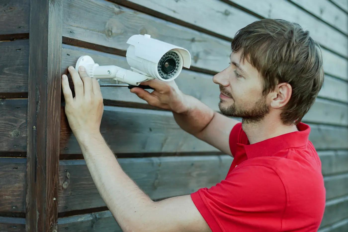 Exterior security cameras around a family home — photo 1